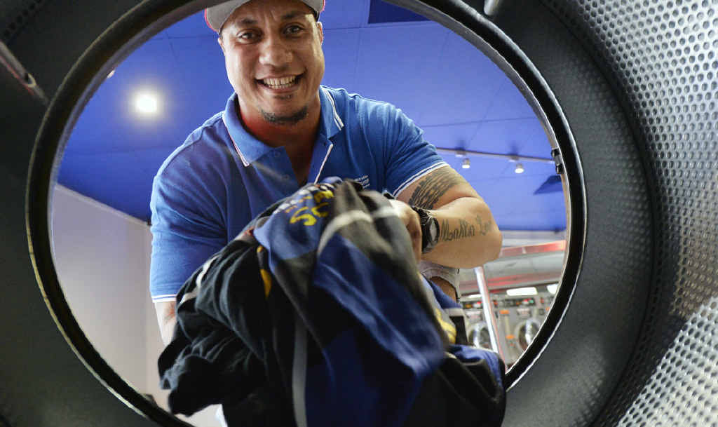 CLEANING UP: Former NRL star Sione Faumuina has opened a new business in Springfield, the Springfield Serviced Laundromat. CLEANING UP: Former NRL star Sione Faumuina has opened a new business in Springfield, the Springfield Serviced Laundromat.